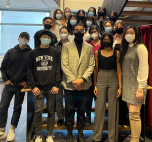 Group shot of the NYU: Tandon School of Engineering Class of 2022, standing in a hallway wearing masks.